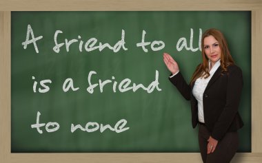 Herkese gösteren öğretmen blackboar üzerinde hiçbiri dostudur