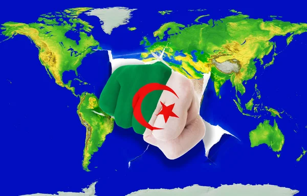 Fist in color national flag of algeria punching world map — Stock Photo, Image