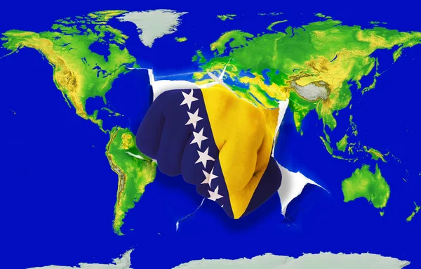 Ököllel a színes lyukasztó w Bosznia-Hercegovina zászlaja — Stock Fotó