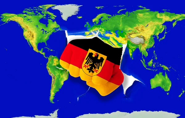 Poing en couleur drapeau national de l'Allemagne carte du monde de poinçonnage — Photo