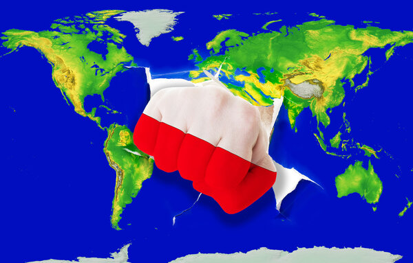 Fist in color national flag of poland punching world map