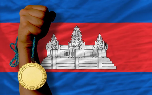 Medalha de ouro por esporte e bandeira nacional da cambodia — Fotografia de Stock