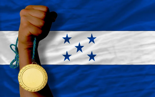 Gouden medaille voor sport en nationale vlag van honduras — Stockfoto