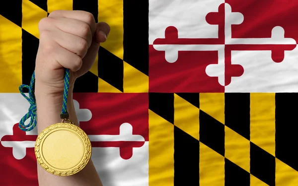 Medalla de oro por deporte y bandera del estado americano de Maryland — Foto de Stock