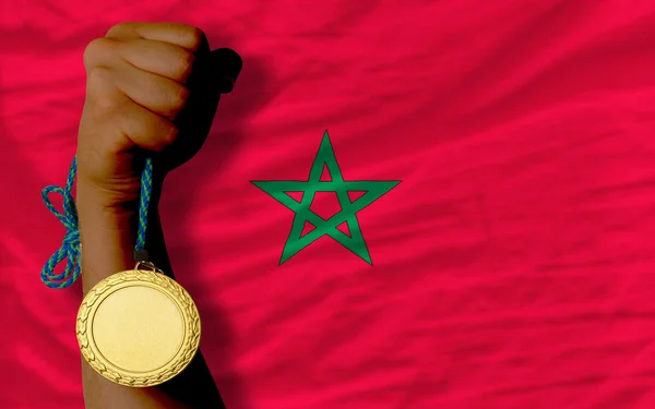 Medaglia d'oro allo sport e bandiera nazionale del Marocco — Foto Stock