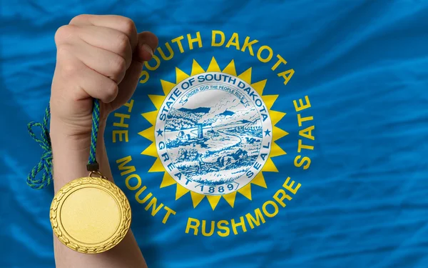 Gold medal for sport and national flag of south dakota — Stock Photo, Image