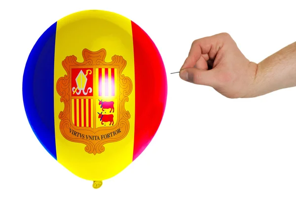 Bursting balloon colored in national flag of andorra — Stock Photo, Image