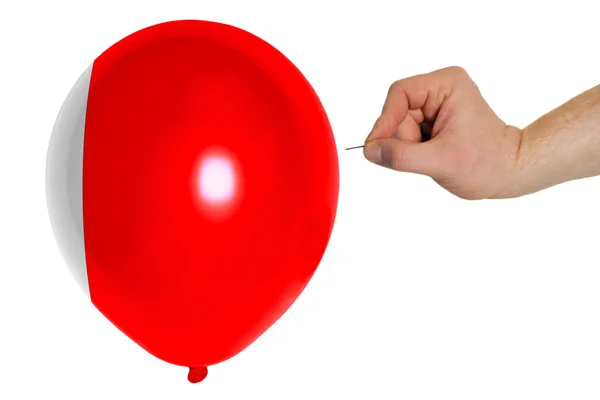 Bursting balloon colored in national flag of bahrain — Stock Photo, Image