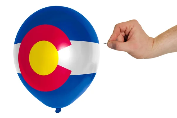 Balão estourando colorido na bandeira do estado americano de colorado — Fotografia de Stock