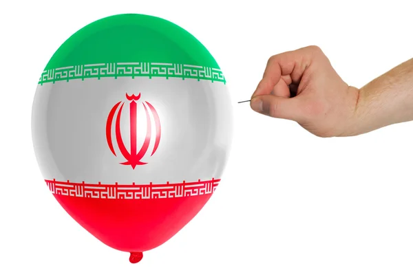 Разрывающийся воздушный шар, окрашенный в национальный флаг Ирана — стоковое фото
