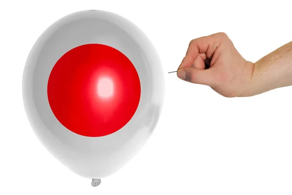 Balão estourando colorido na bandeira nacional do japão — Fotografia de Stock