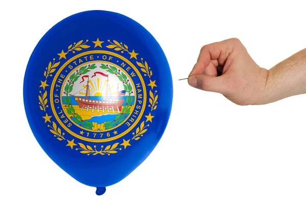 Ballon barsten gekleurd in de vlag van Amerikaanse staat van nieuwe hamps — Stockfoto