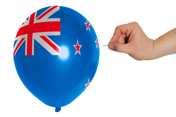 Bursting balloon colored in national flag of new zealand — Stock Photo, Image