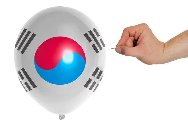 Bursting balloon colored in national flag of south korea — Stock Photo, Image