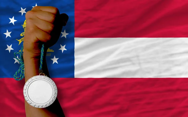 Zilveren medaille voor sport en de vlag van de Amerikaanse staat georgia — Stockfoto