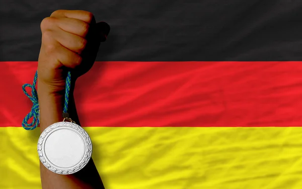 Medalla de plata por deporte y bandera nacional de Alemania —  Fotos de Stock