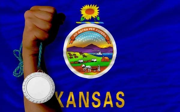 Silver medal for sport and flag of american state of kansas — Stock Photo, Image