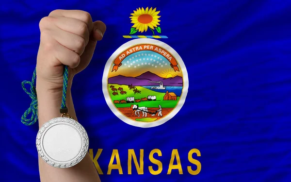 Silver medal for sport and flag of american state of kansas — Stock Photo, Image