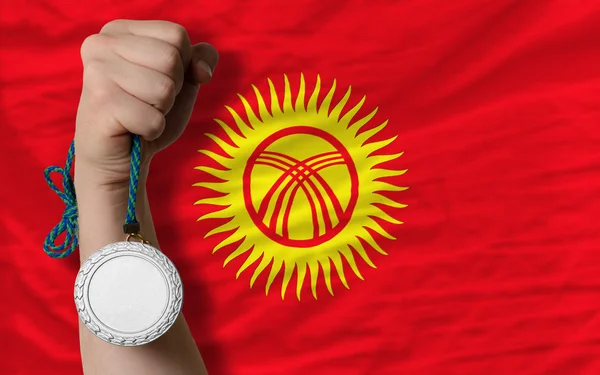 Silver medal for sport and national flag of kirghizstan — Stock Photo, Image