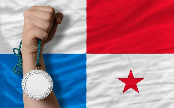 Stříbrná medaile pro sport a státní vlajka Panamy — Stock fotografie