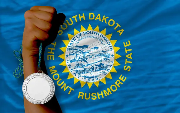 Zilveren medaille voor sport en nationale vlag van Zuid-dakota — Stockfoto