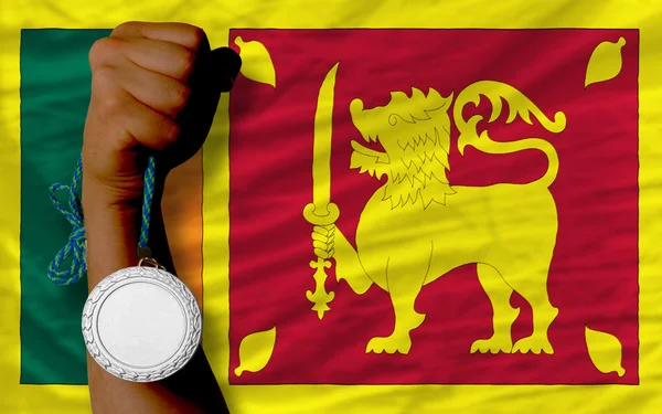 Medaglia d'argento per lo sport e bandiera nazionale di srilanka — Foto Stock