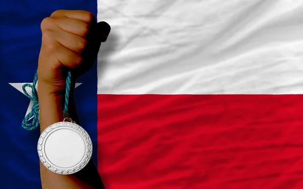 Silver medal for sport and flag of american state of texas — Stock Photo, Image