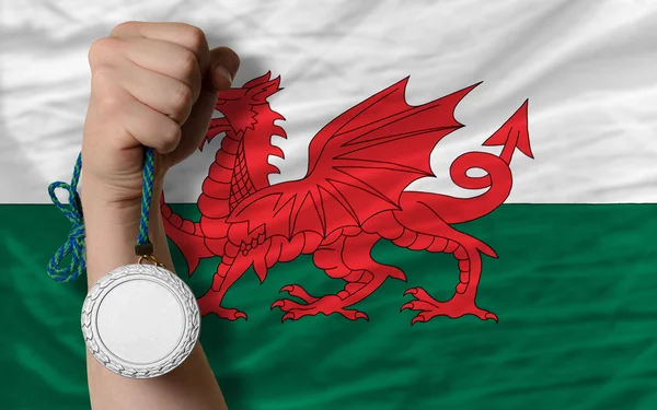 Silver medal for sport and national flag of wales — Stock Photo, Image