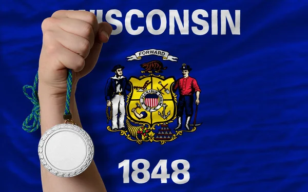 Silver medal for sport and flag of american state of wisconsin — Stock Photo, Image