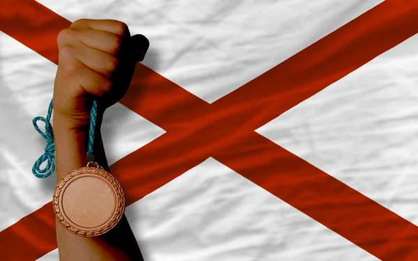Medalla de bronce por deporte y bandera del estado americano de alabama — Foto de Stock