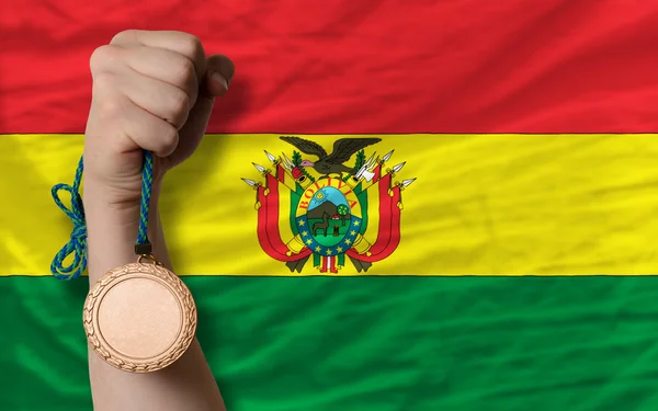 Medaglia di bronzo per lo sport e bandiera nazionale della Bolivia — Foto Stock