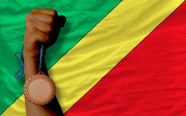 Medalla de bronce por deporte y bandera nacional de congo — Foto de Stock