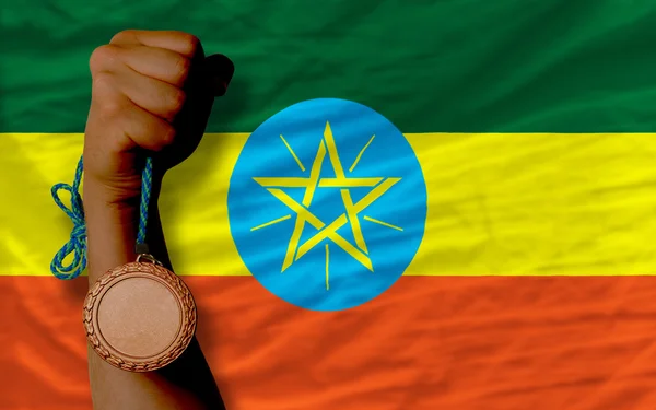 Medalla de bronce por deporte y bandera nacional de etiopía —  Fotos de Stock