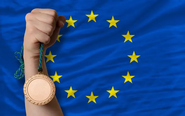 Bronzen medaille voor sport en nationale vlag van Europa — Stockfoto