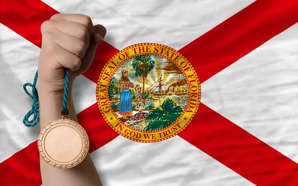 Medalla de bronce por deporte y bandera del estado americano de Florida —  Fotos de Stock