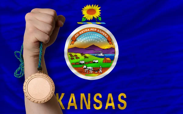 Medalha de bronze por esporte e bandeira do estado americano de Kansas — Fotografia de Stock