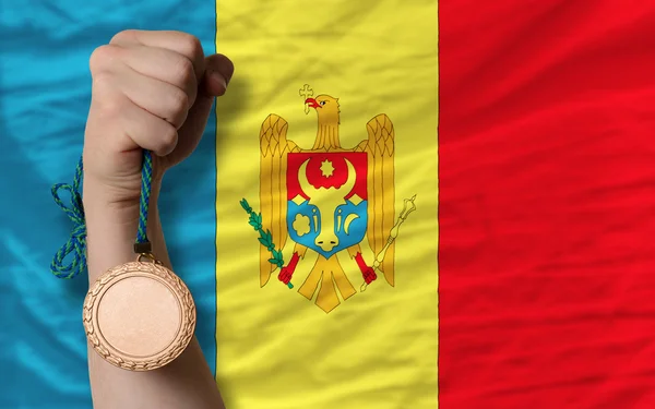 Bronze medal for sport and national flag of moldova — Stock Photo, Image