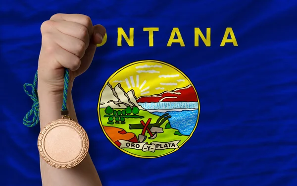 Medalha de bronze por esporte e bandeira do estado americano de montana — Fotografia de Stock