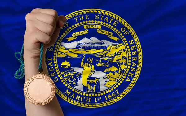 Brązowy medal dla sportu i flaga amerykańska stanu nebraska — Zdjęcie stockowe