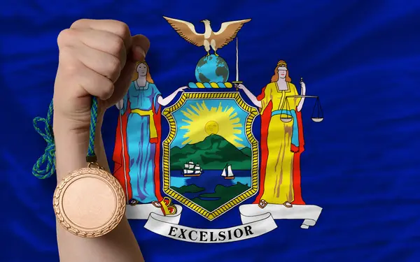 Bronzemedaille für Sport und Flagge des amerikanischen Bundesstaates New York — Stockfoto