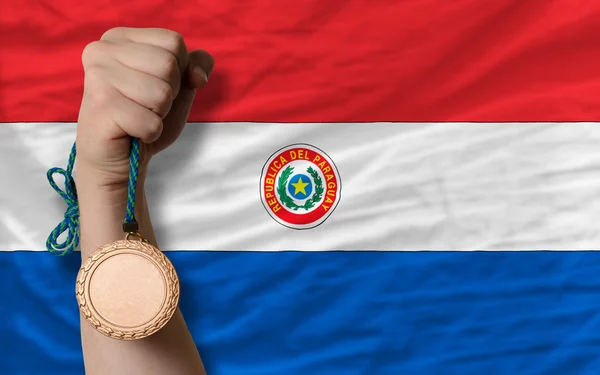 Bronze medal for sport and national flag of paraguay — Stock Photo, Image