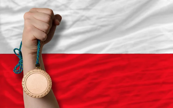 Medalha de bronze por esporte e bandeira nacional da Polônia — Fotografia de Stock