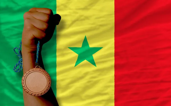 Medalla de bronce por deporte y bandera nacional de senegal —  Fotos de Stock