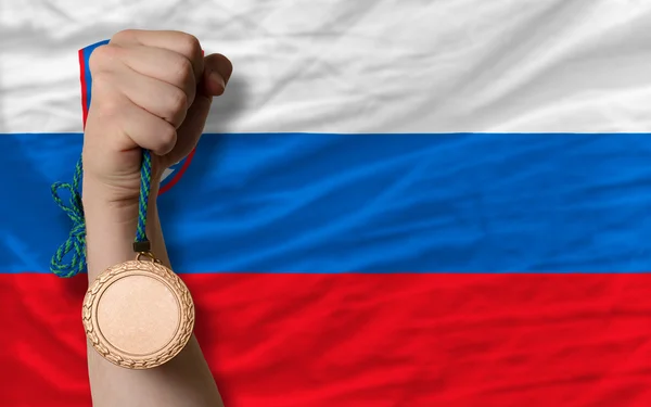 Medalha de bronze para esporte e bandeira nacional de slovenia — Fotografia de Stock