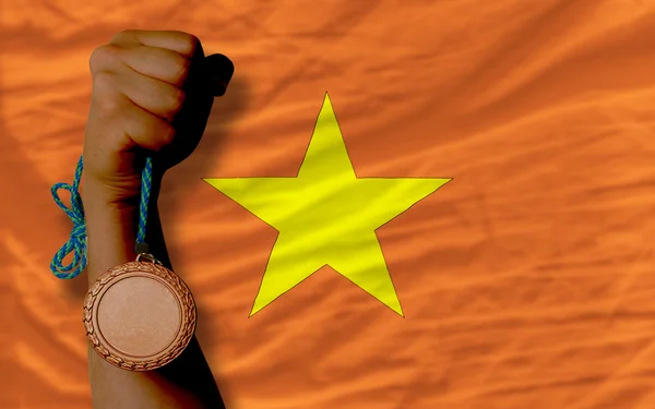 Bronze medal for sport and national flag of vietnam — Stock Photo, Image