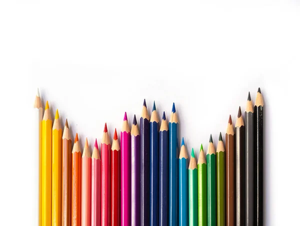 Colorful multicolored pencils on white background. Education, Business and finance concept with copy space. Art