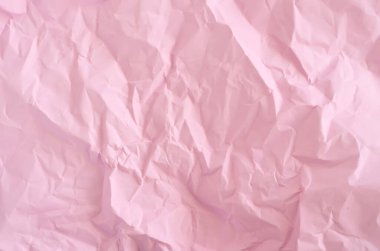 Pembe buruşuk kağıt desenli yüzey dokusu arkaplanı.