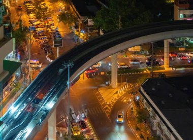 Aerial view of intersection or junction with cars traffic, Bangkok Downtown. Thailand. Financial district in smart urban city.