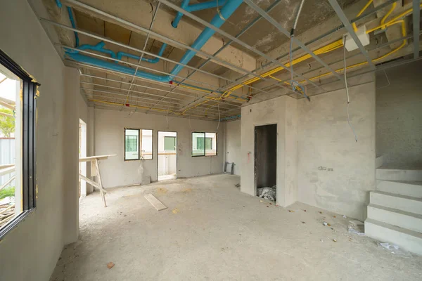 Empty under construction room in home or house with space on site. Interior. Old unfurnished room rental property, living space units. lifestyle. Renovation.