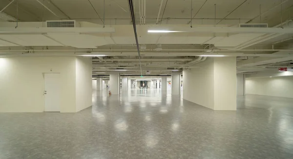 Empty room in shopping mall hall with space. Interior design. New modern room rental property, living space units. lifestyle.